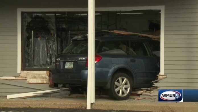 video:-car-careens-into-dry-cleaning-business