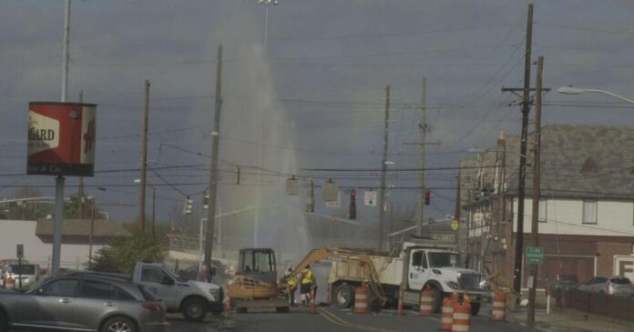 water-main-break-creates-geyser-at-intersection water-main-break-creates-geyser-at-intersection