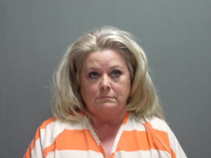 woman-accused-of-spitting-in-casket-charged