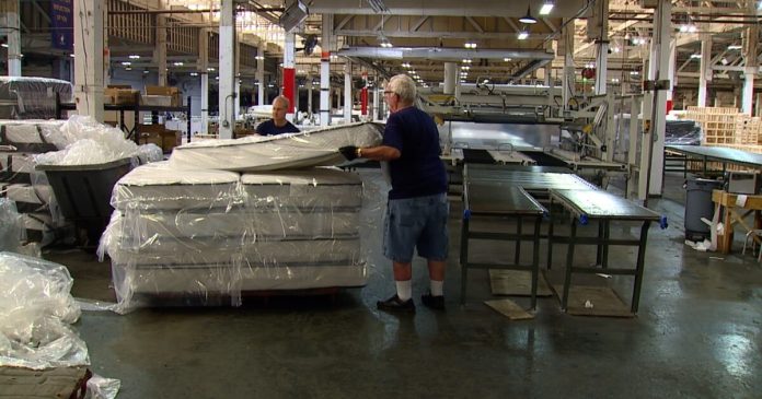 company-donates-100-mattresses-to-furniture-bank