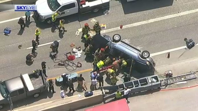 crews-rescue-person-trapped-in-suv-rollover